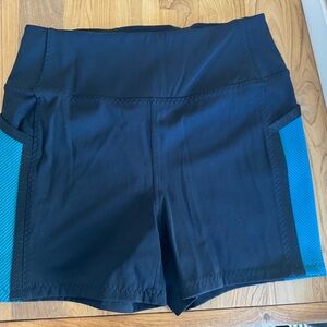 Black Athletic Women’s Shorts with Teal Side Panels